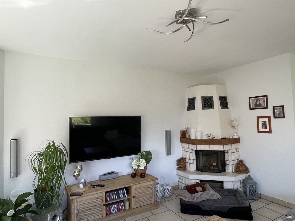Wohnzimmer mit Kamin EG